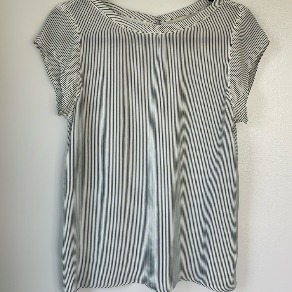 Loft size S Black and White striped top
16” arm pit to arm pit
25” long